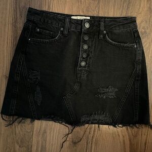 Free People Ripped Mini Jean skirt Size 26 in Black.